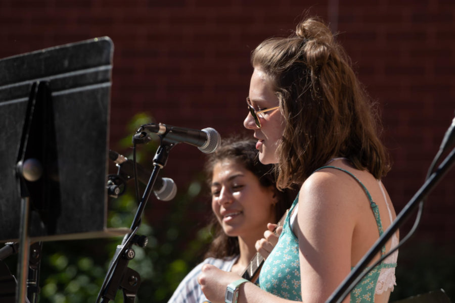 Senior Jess Orr performs with senior Zoe Feinberg at the benefit concert organized by Orr on June 4.