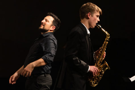 Dae Taylor performs at the George H. Slick concert on June 7 while Mr. Nick Pignataro conducts the ensemble.