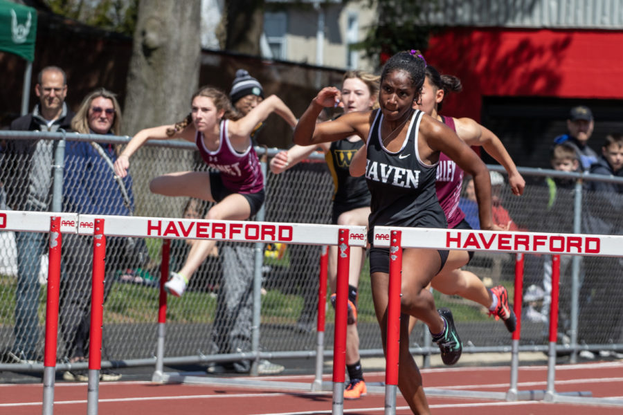 KEEPING+THE+STREAK+ALIVE+%7C+Senior+Teghan+Sydnor+races+for+the+hurdles+at+the+Haverford+meet+on+April+2.
