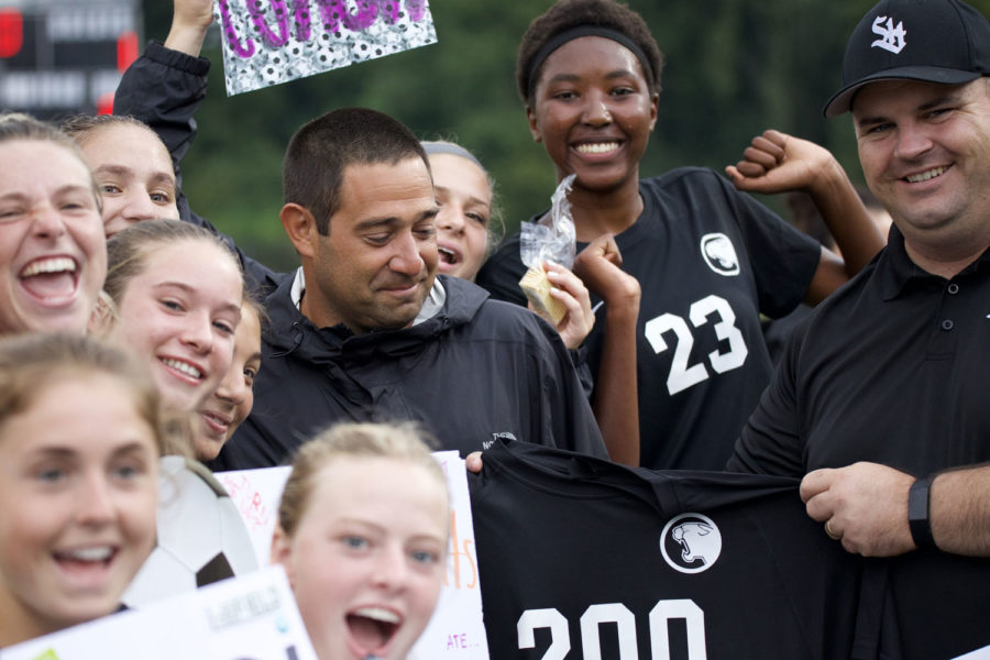 Head+girls+soccer+coach+Gino+Miraglia+receives+his+200-win+jersey+from+Athletic+Director+Mr.+Pat+Clancy+at+the+home+game+versus+Upper+Darby+on+Sept.+6