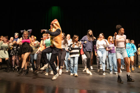 The audience and participants of the Lip-Sync Battle dance to the Cupid Shuffle. They were told they would have an anonymous donor for the MiniThon charity if they all danced on stage, in which they ended up with raising $1500.