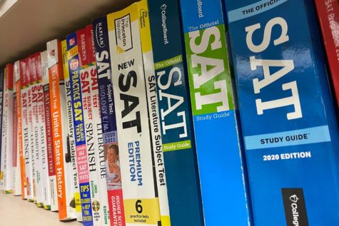 SAT prep books line the shelves in the counseling office.