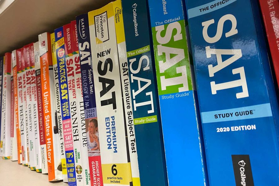 SAT+prep+books+line+the+shelves+in+the+counseling+office.