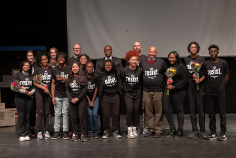 The group of Young Activists Coalition members who organized the assembly poses for a photo with the school leaders and community members who participated.