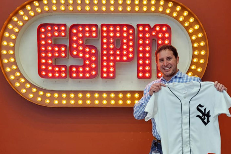 Drew Gallagher 95 poses with his Haven baseball jersey at ESPN headquarters in Bristol, Conn.