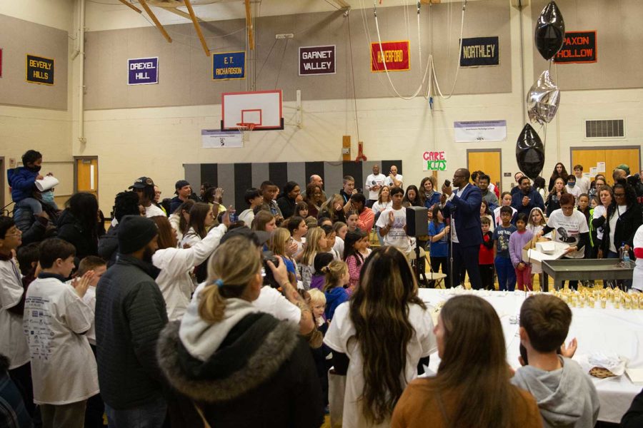 At the conclusion of the inaugural MLK Day of Service, participants came together in the middle school gym to share a birthday cake for Dr. Martin Luther King, Jr.
