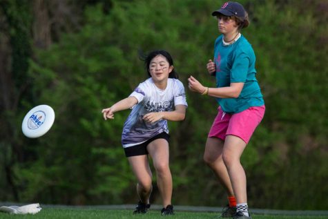 Sophomore Sophie Lin reaches for a disc during a match against Radnor High School. 