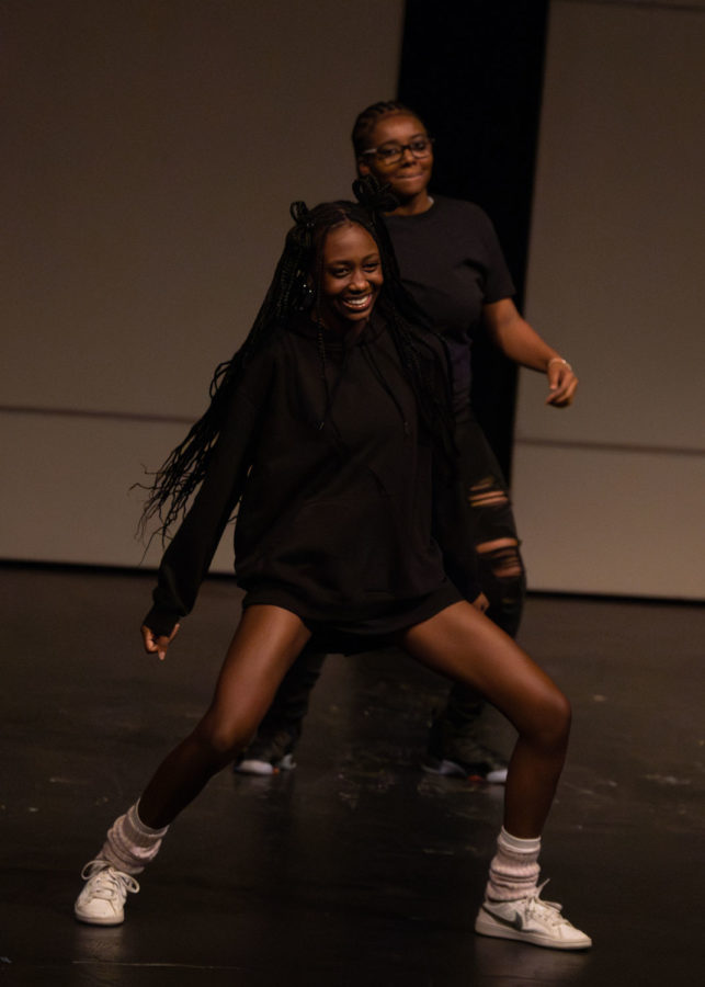 Senior performer Amayah Wade pumps her chest to the rhythm of a dance song during her dance team’s performance. 

