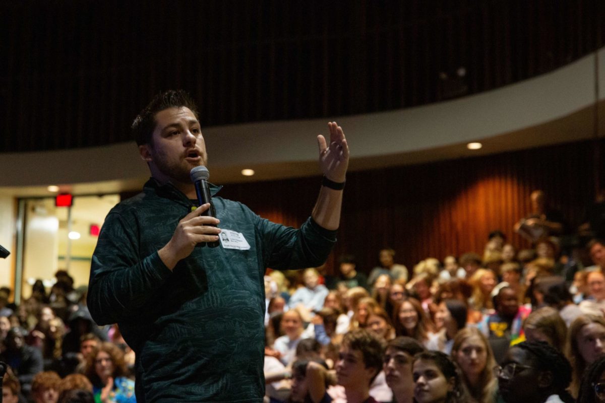 IT GETS BETTER • Speaker Louis Desanto shares
the improvements his life has seen after working
through his struggles. “I liked seeing the results at
the end, you know, seeing how there is that light
at the end of the tunnel,” senior Gavin Schmidt
said. PHOTO: JOE LYNCH ’24