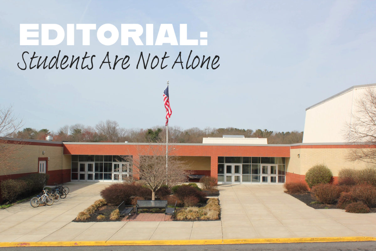 ILLUSTRATION: The front of Strath Haven High School on a fall day