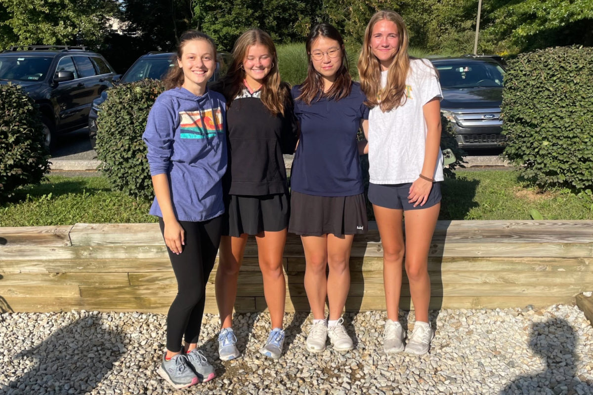 SETTING THE PAR • Senior Catherine Caruso, junior Helena Kaufman, senior Iris Cheng, and junior Brooke Forbes are the first four members of the girls Golf Team.