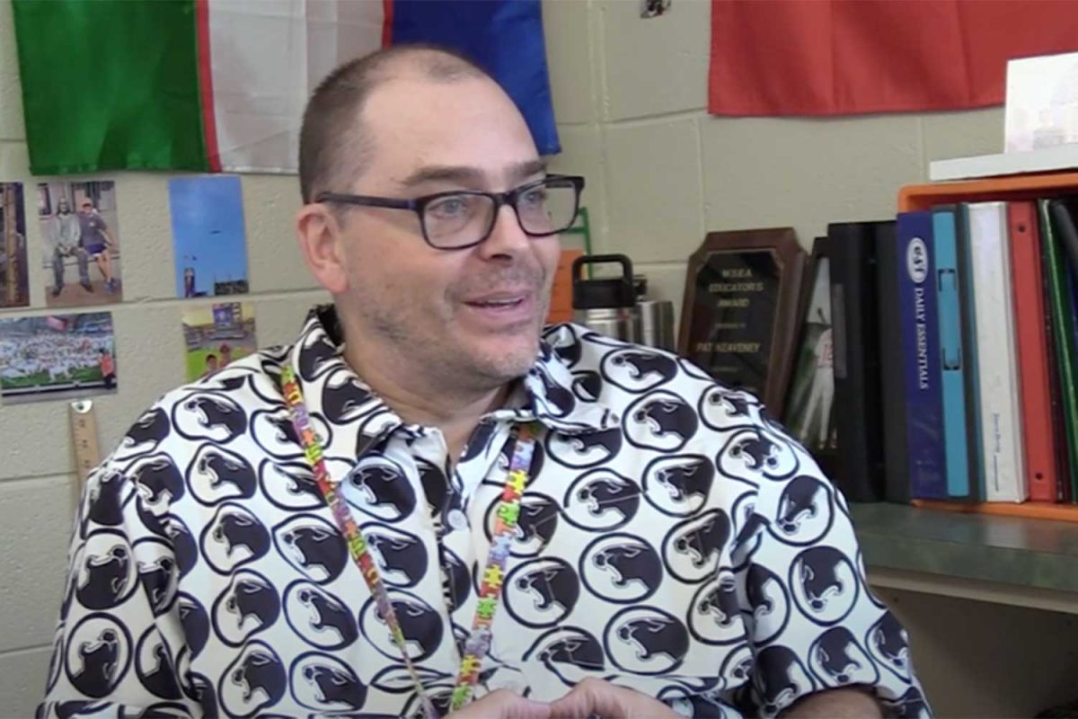 Mr. Pat Keaveney wears a shirt made out of his custom Strath Haven fabric. (Video still)