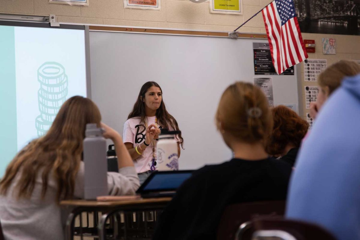 Seniors listen to teacher Ms. Harris talk about financial aid in college on October 10, 2023. The school decided to provide options for seniors to learn more about college during the sophomore and junior PSAT time. "I actually really like it, cause like, it kind of gives you an intro to your future and that's awesome," senior Andrew Scanlon said.