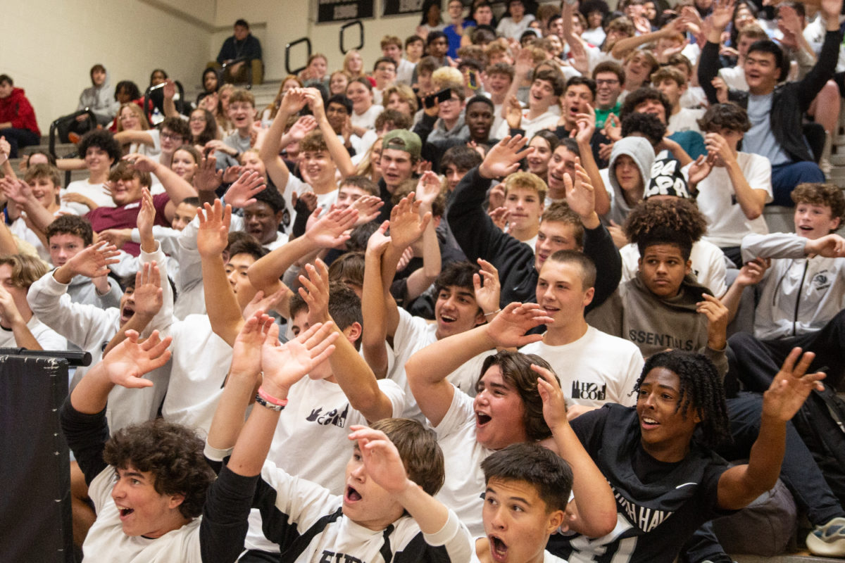 Sophomores participate in a roller coaster ride at the pep rally on October 13.