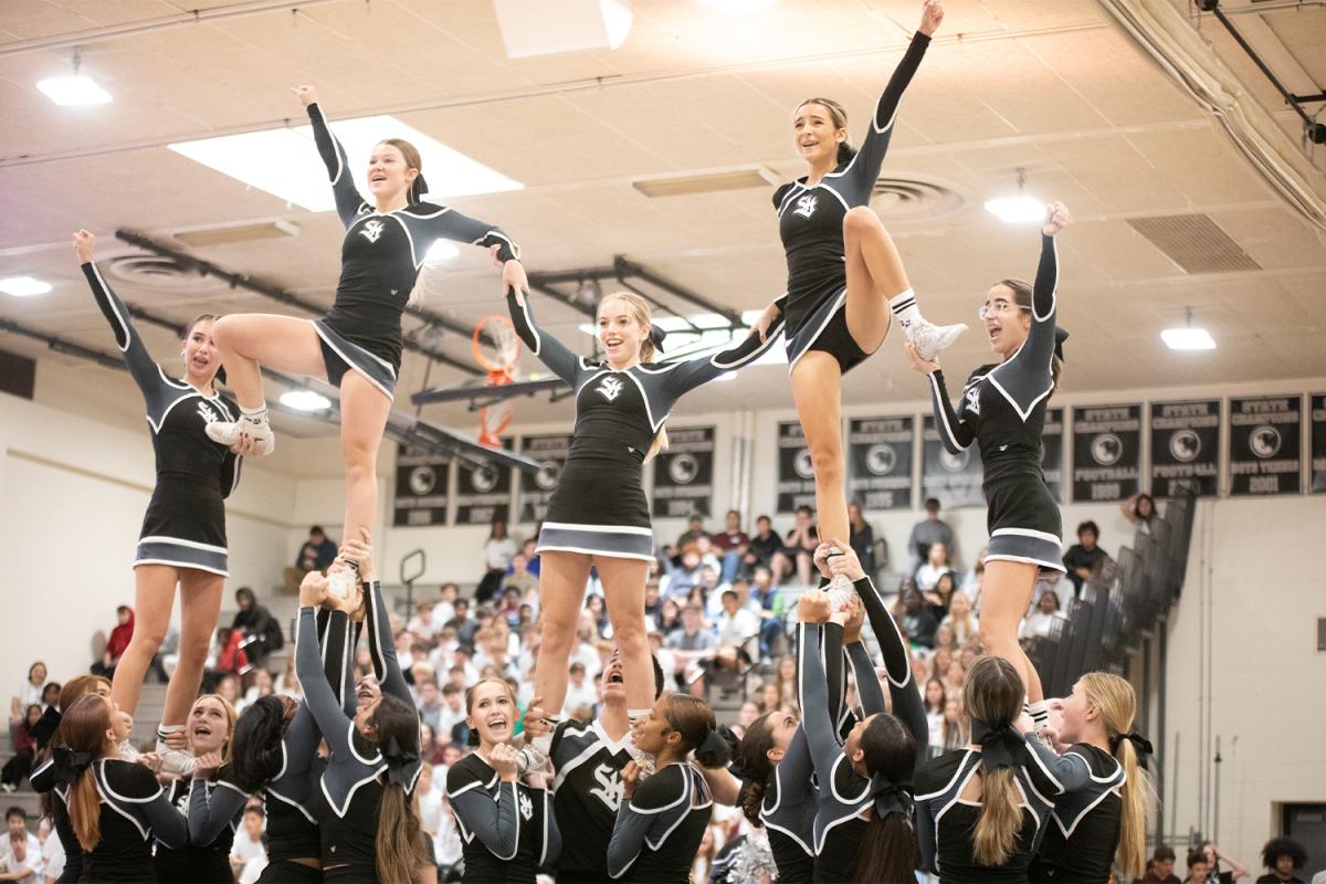 The Strath Haven cheer team executes a formation for the student body at the Homecoming Pep Rally on October 13. 