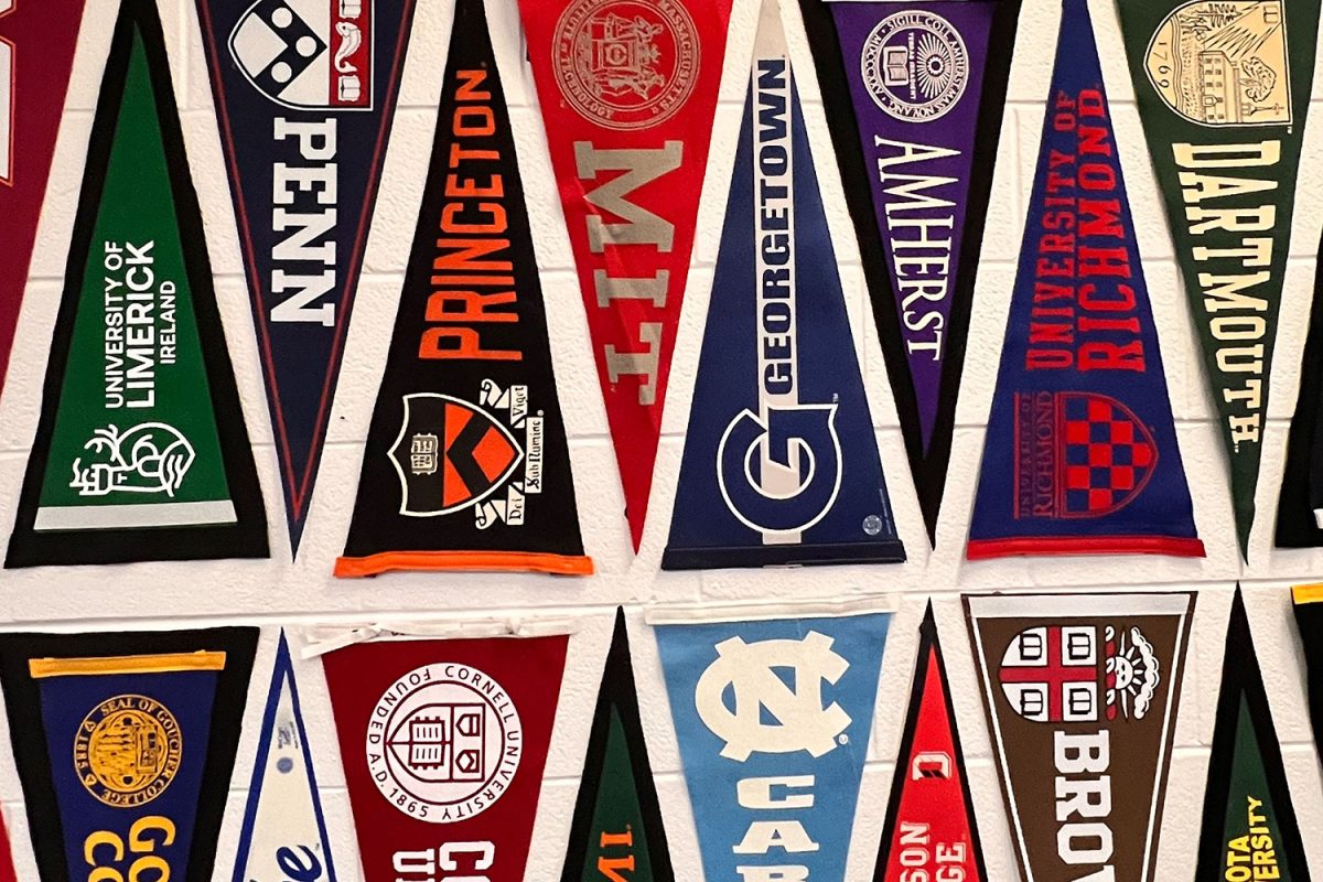 College banners hang in the Career and College Counseling office.