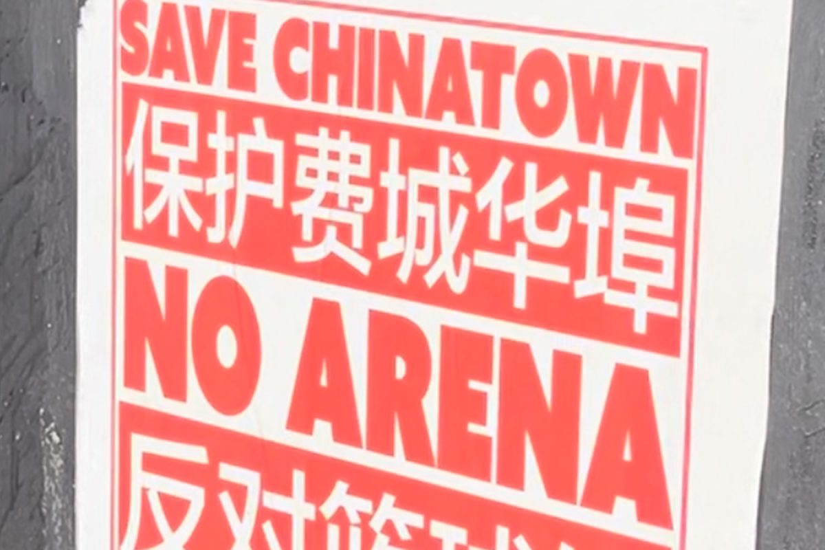 No+Arena+in+Chinatown+poster+is+pasted+on+an+affiliated+restaurant+in+Chinatown.