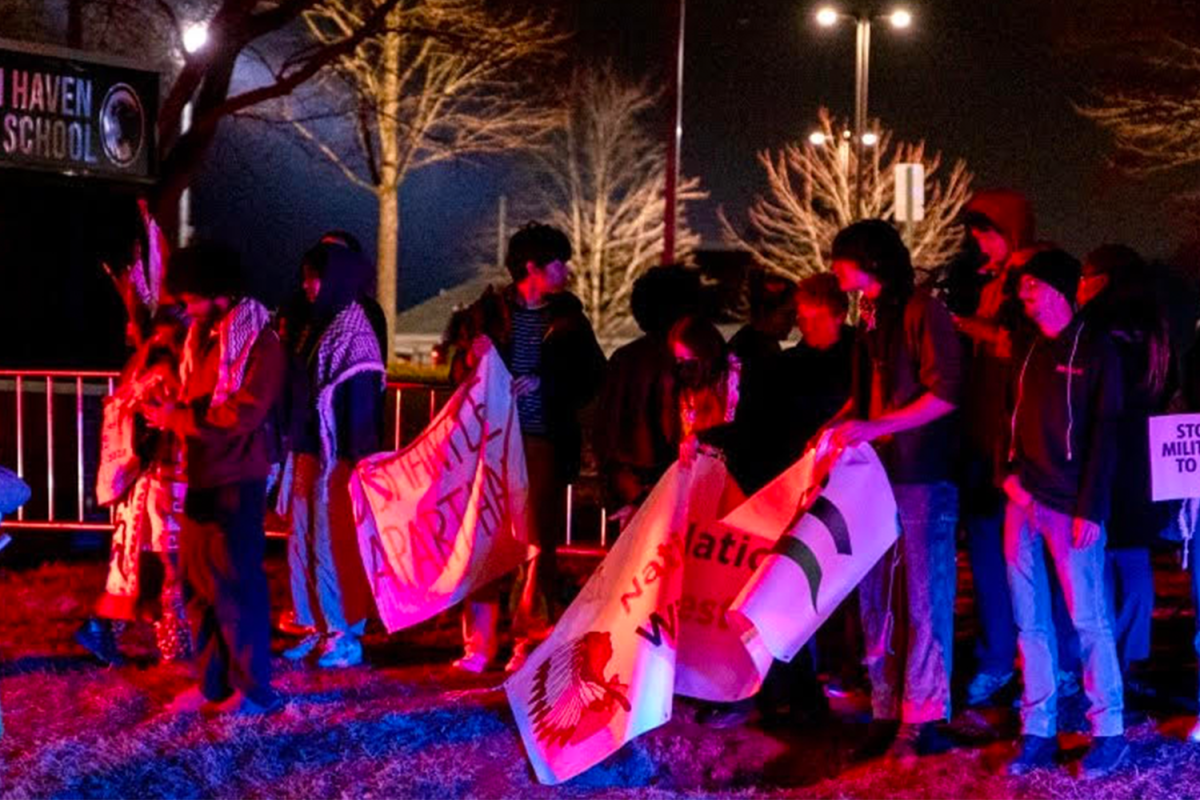 Pro-Palestinian protesters demonstrate outside Strath Haven Middle School on March 8 during President Joe Bidens visit to the middle school. The protesters remained at the event throughout, and hung signs that were removed shortly after the event ended.