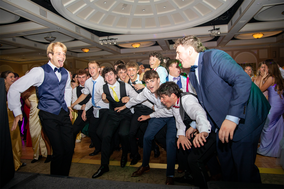 Seniors act out the ‘Tik Tok Rizz Party’ on the dance floor during the song ‘Carnival’ by ¥$ at Senior Ball.