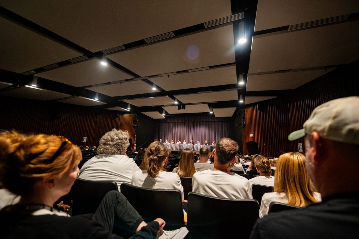 WSSD Teachers and community members listen to the school board meeting on the evening of Tuesday, August 27 in the Strath Haven Middle School Auditorium. Many WSSD teachers and staff in attendance at the meeting wore union-branded white t-shirts in support of the WSEA (Wallingford-Swarthmore Educators Association) teachers union.