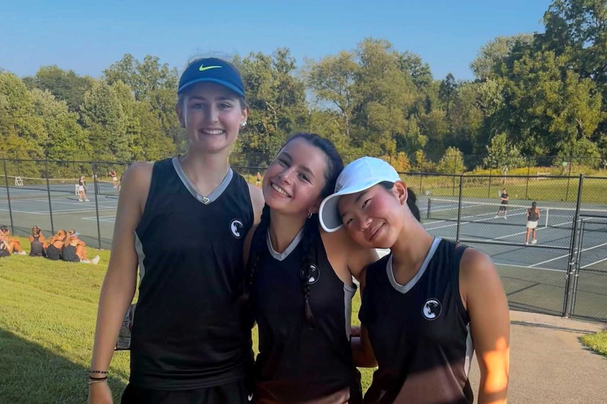 After a match against Conestoga on August 22, tennis women’s singles players sophomore Lena Anderson, senior Abby Rappaport, and junior Minori Saito pose together. Photo provided by Minori Saito