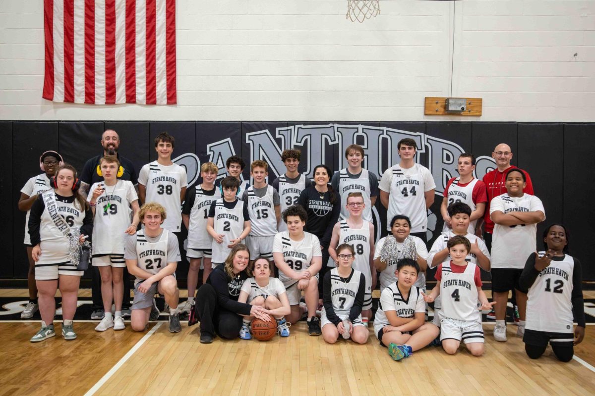 Unified Basketball members pose together for an end-of-season photo. Their only home game against Marple Newtown marked their last for this season. 