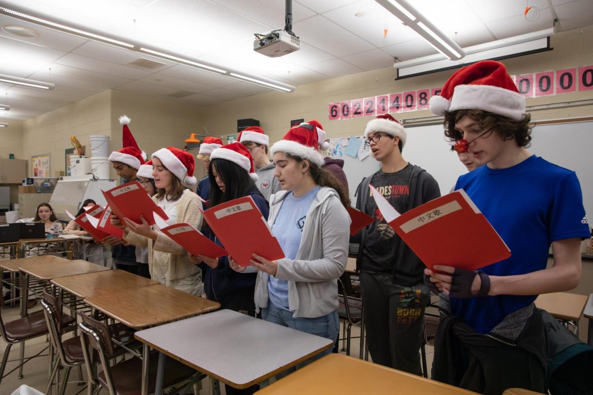 On December 20, Ms. Nancy Tang's Chinese 4 Honors class carols Rudolph the Red Nosed Reindeer in Chinese to Mrs. Ciamaichelo's chemistry class. They also performed for Mr. Robert Zakrzewski and Mr. Daniel Peterson's classes.