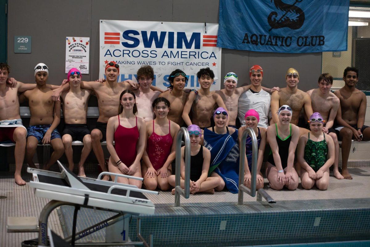 Rex Storch Memorial Swim-a-Thon participants pose for a photo on January 18.