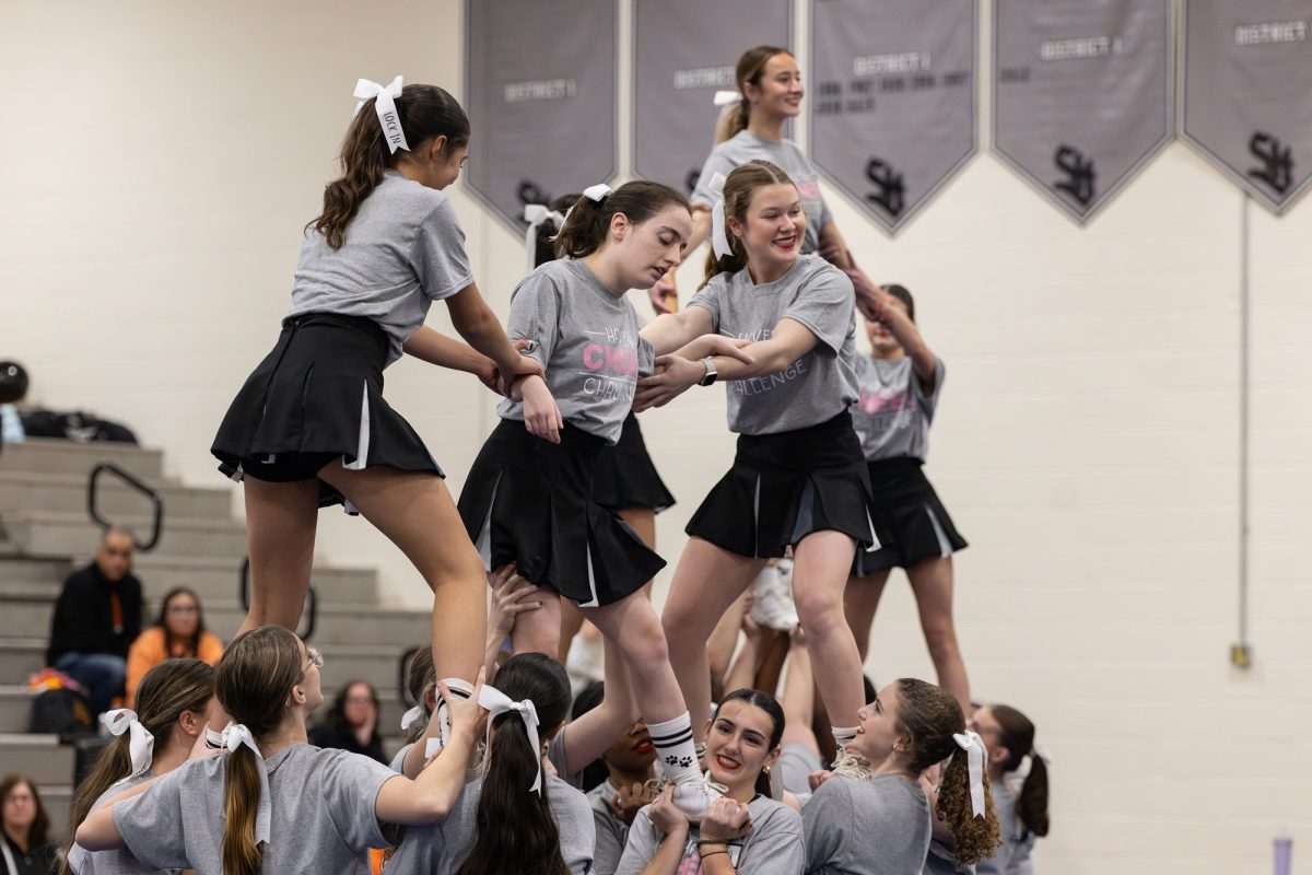 Members of the Strath Haven Sparkle Cheerleading Team perform at the Haven Cheer Challenge on December 7. (K. Plows)