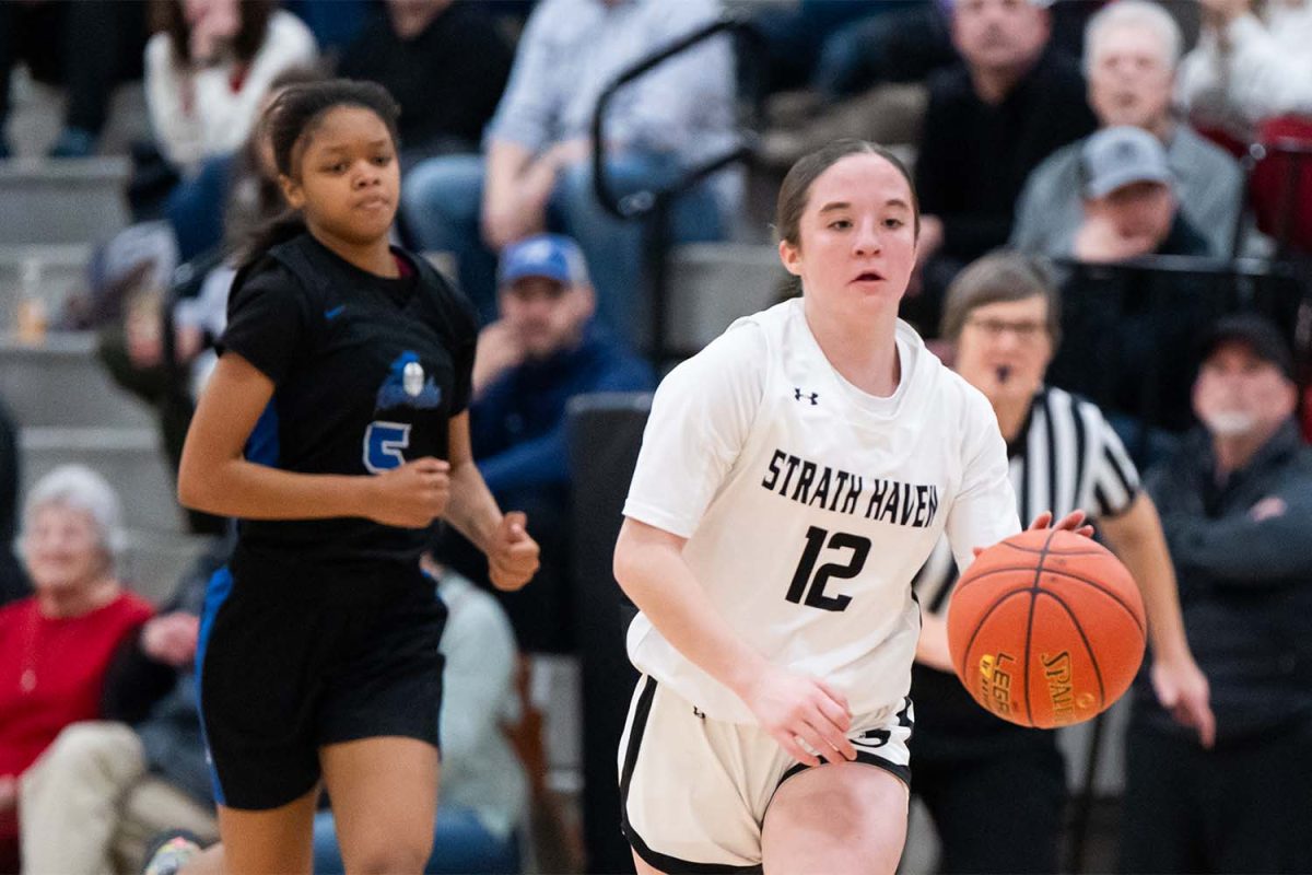 Freshman Maddie Fanning drives toward the basket during the PIAA District I 5A playoff game against Academy Park on Friday, February 14.