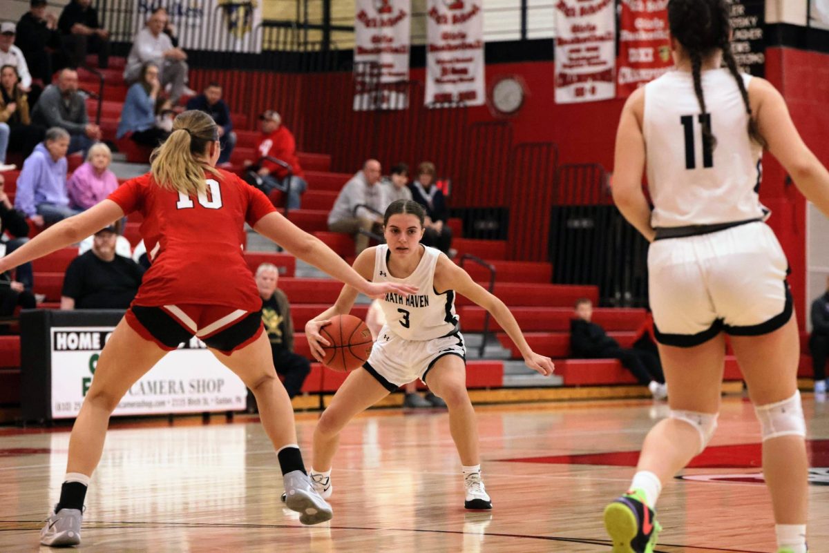 Senior Maryella Gill looks for open space at Easton Area Middle School on Saturday, March 15.