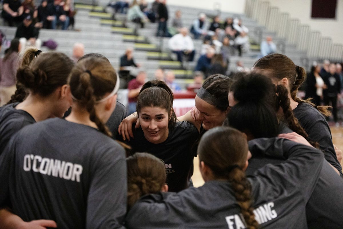 The team shares a pregame huddle before the PIAA District 1 5A state playoff game.