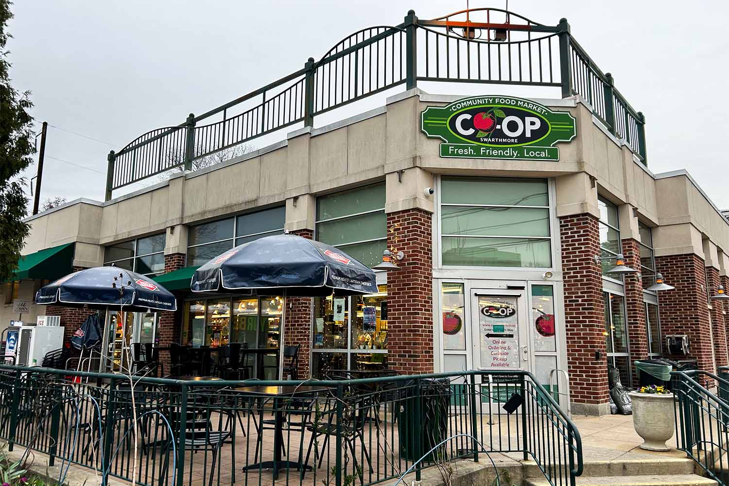 The Swarthmore Cooperative sits on Dartmouth Avenue, right on the edge of the town center. The outdoor tables on its patio act as a gathering place for students, especially in the summer.