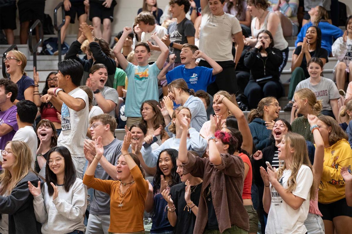 Students celebrate at the yearbook distribution assembly on August 30, 2024 in the Strath Haven gymnasium.
