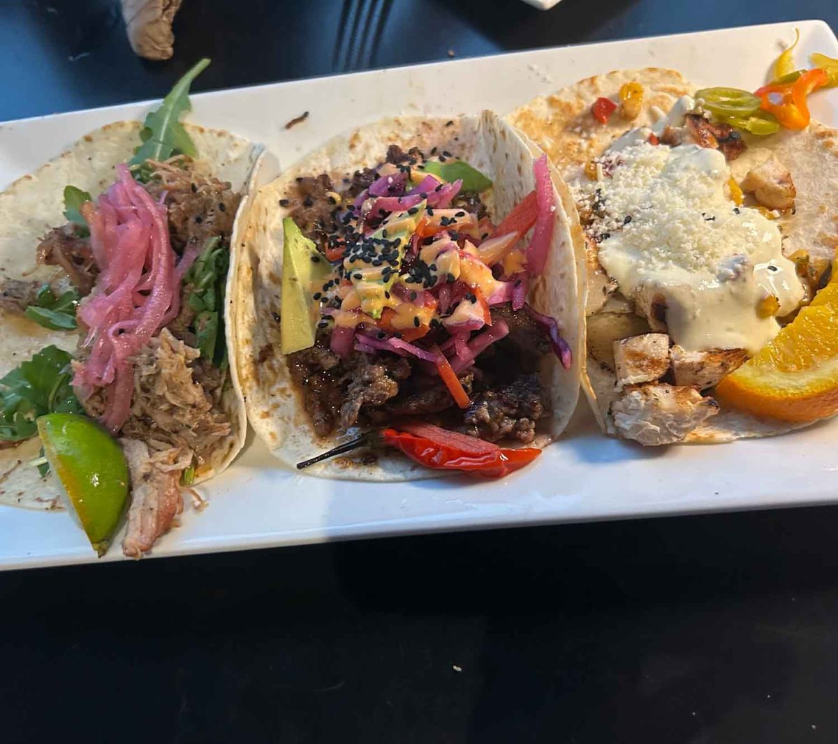 A colorfully unique flight of tacos.