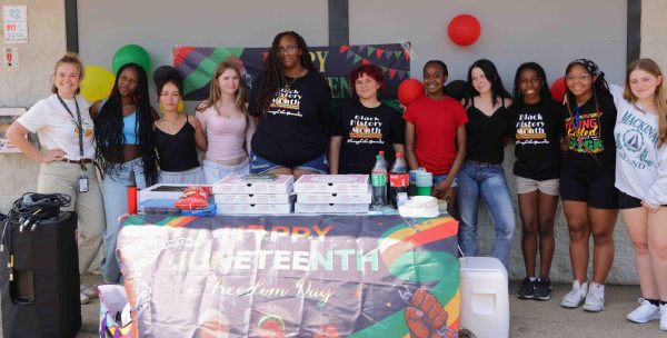 Navigation to Story: PHOTOS: Students, teachers celebrate Juneteenth with poems, art, awareness