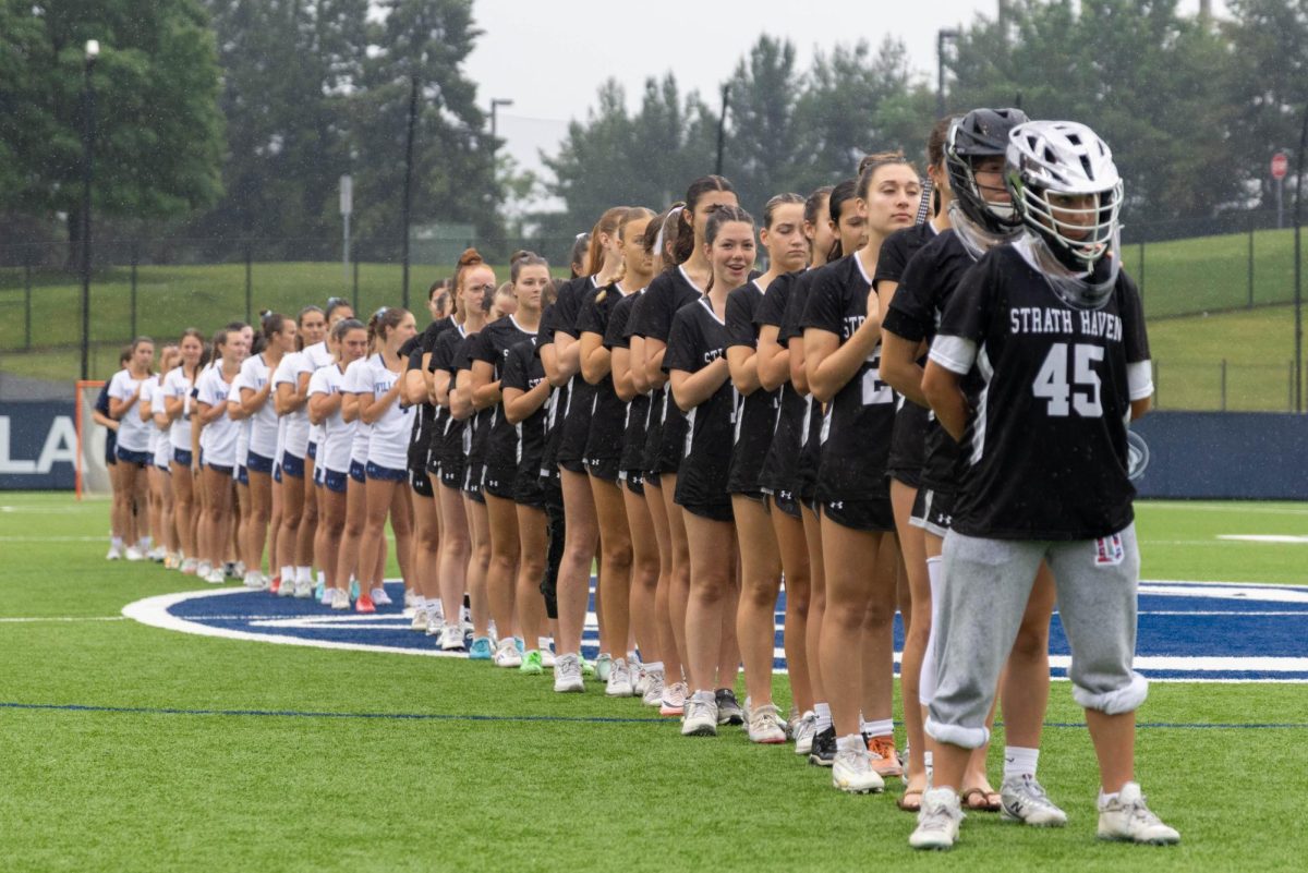 Both teams line up for the national anthem in the PIAA 2A state final in State College on Saturday, June 14.