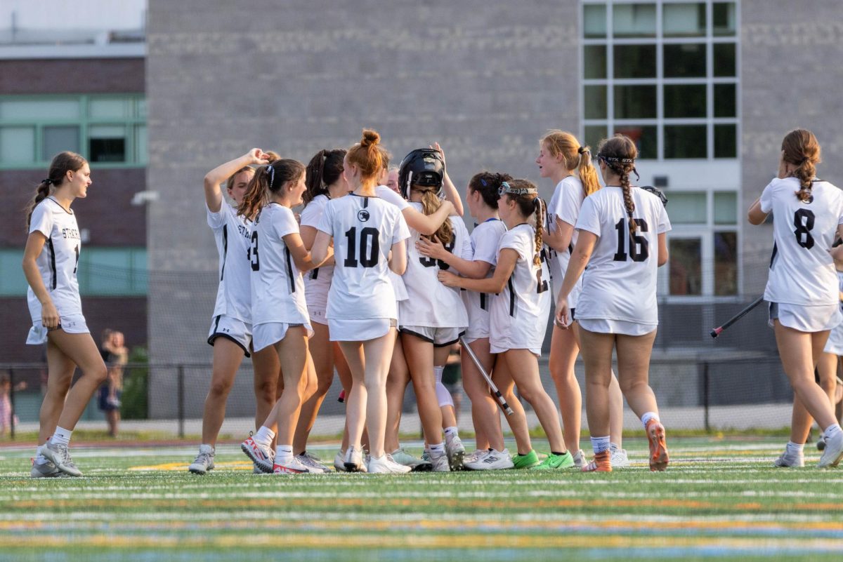 Panthers varsity girls lacrosse celebrates the win on June 3..