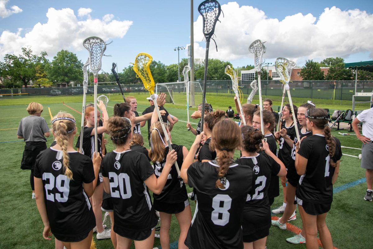 The team shows sportsmanship by thanking the Comets for playing on Saturday, June 7, at Emmaus High School.