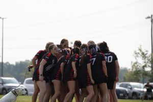 The team breaks a huddle as the timeout ends at the HSNI national tournament, June 13, 2025.