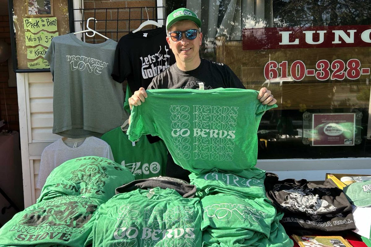 Mr. Brad Hosbach holds one of his Eagles shirts at the pop-up market outside of Lunch Break Vintage on Wednesday, September 3. The event was a celebration of the start of the Eagles season.