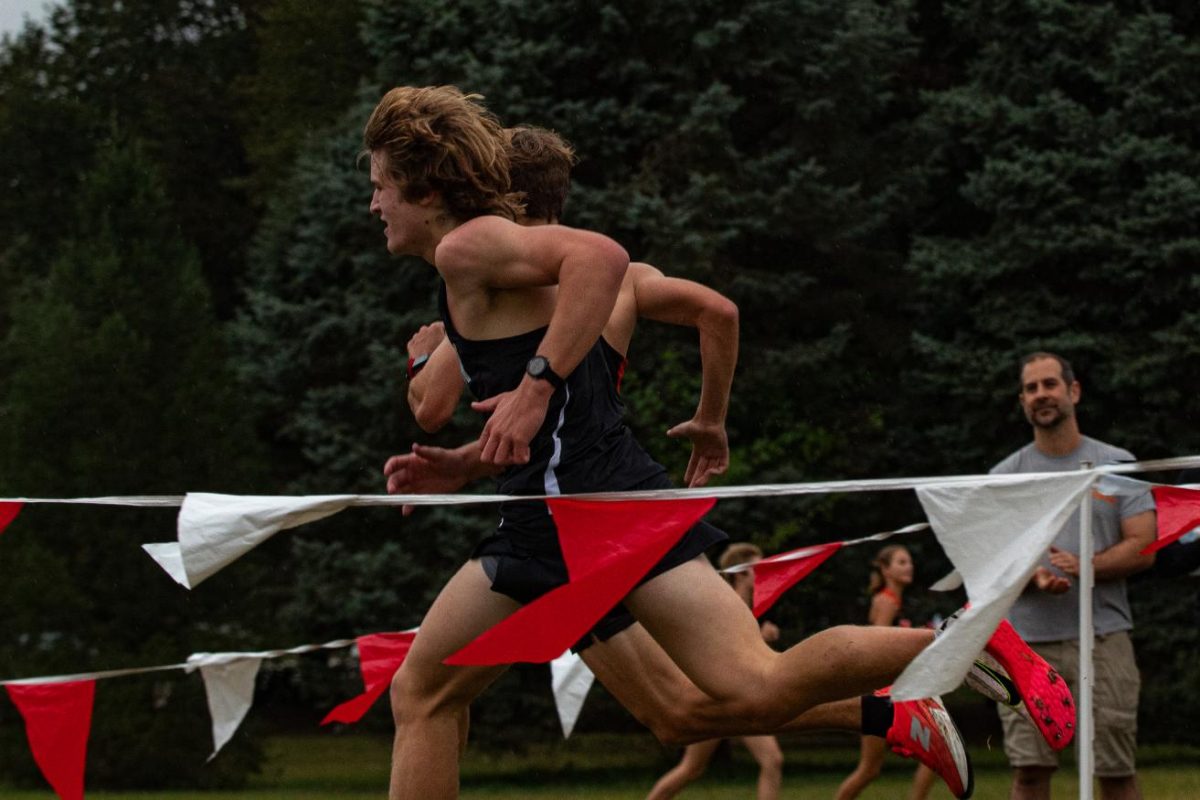 Carson Keller (11) takes the edge on Penncrest in a drastic dash to the finish line on September 17.
