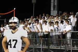 The Panther Pack cheers on the Panthers defense during a critical third down  in a game against Haverford on September 20.