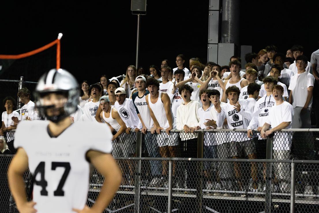 The Panther Pack cheers on the Panthers defense during a critical third down  in a game against Haverford on September 20.