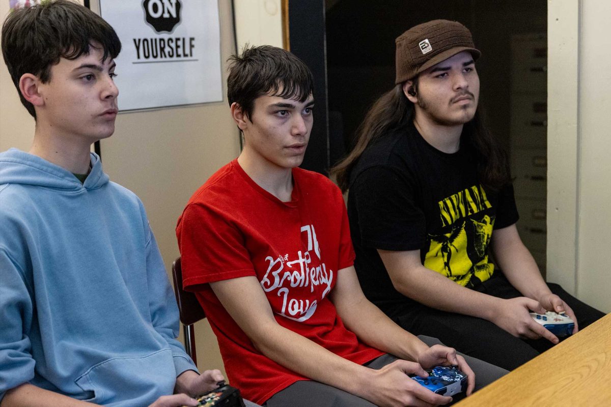 Esports contestants Wesley Shindell (9), Daniel Morris (10), Anavrin Kupprion (10) lock in on the final day of the tournament on Jan. 23 in the computer science room. The club invited anyone who wanted to participate to play 2v2s, regardless of experience.