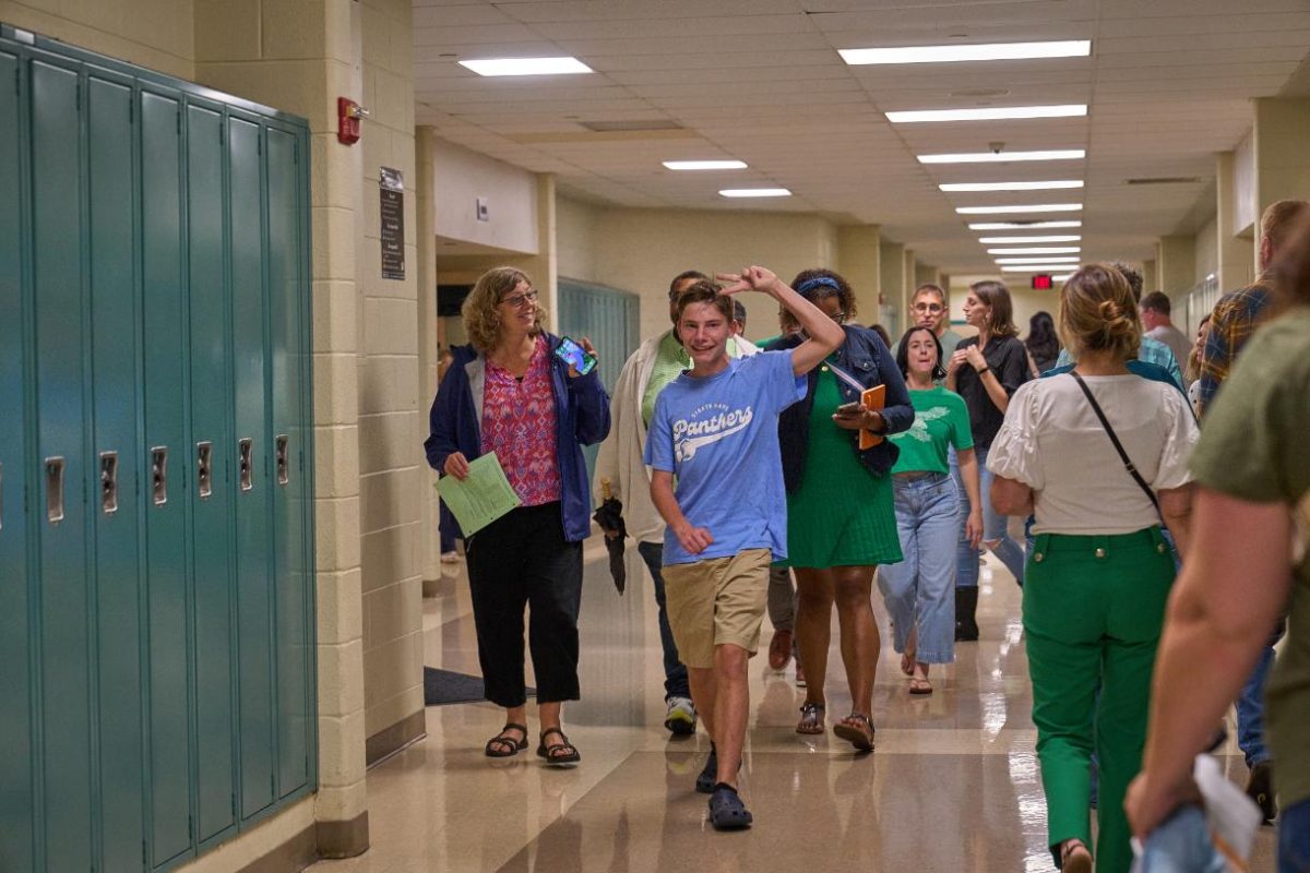 Carter Sturgis (11) representing STUCO at Back-To-School night on September 4. Taking and guiding groups of parents to different floors of the building while offering answers to their questions. 