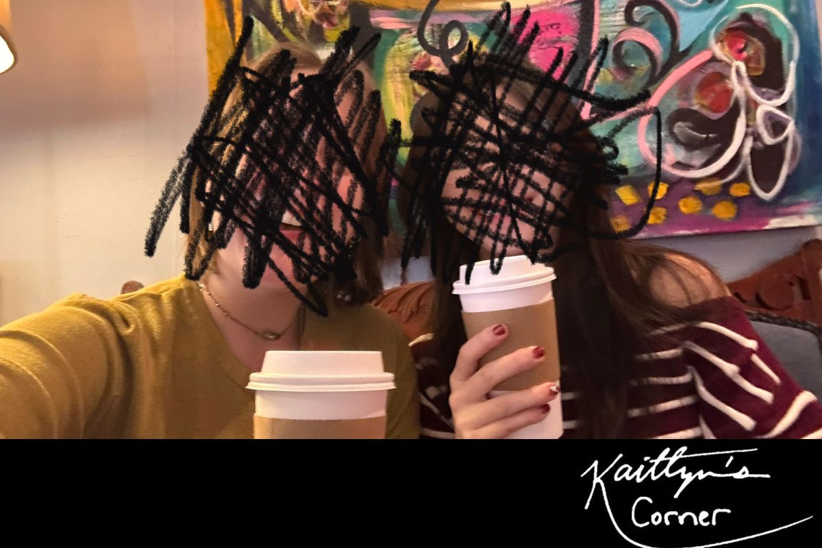 Two friends pose for a picture at a cafe with black scribbles covering their faces. The scribbles are an homage to the popular trend, “I’m forgetting your face” in reference to old friends that have lost touch. 