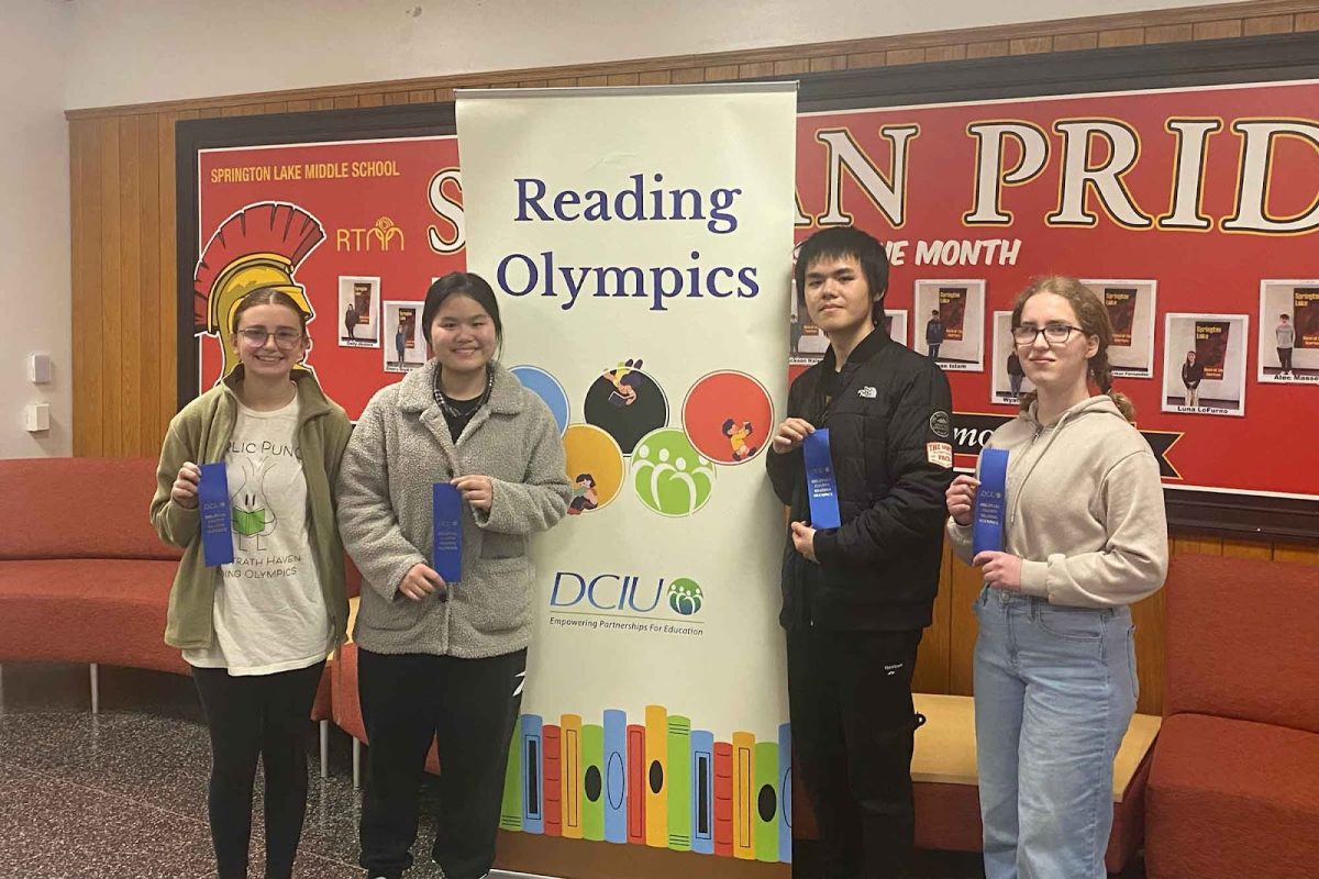 Reading Olympics members pose for a photo at the competition. Held at Springton Lake, it required them to answer a variety of questions on a large array of books. Provided by Francis Fletcher.