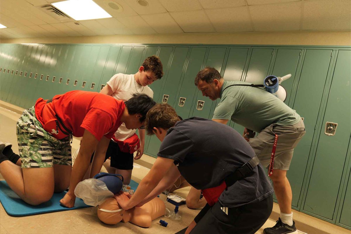Mr. Steve Woolery teaches a lifeguarding class to students in the green mile on Saturday, April 18.