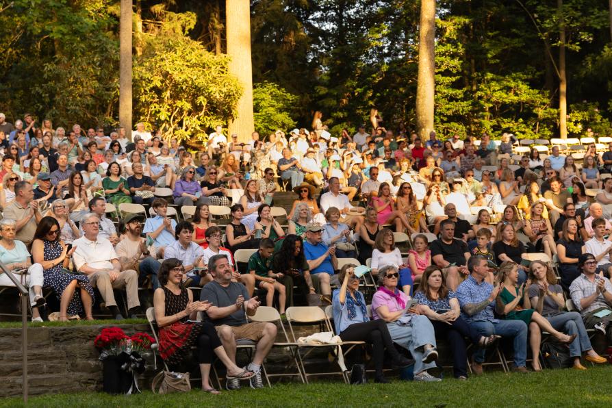 The audience at Commemoration sits in the Swarthmore College Amphitheater, enjoying a beautiful early summer evening on June 4.
